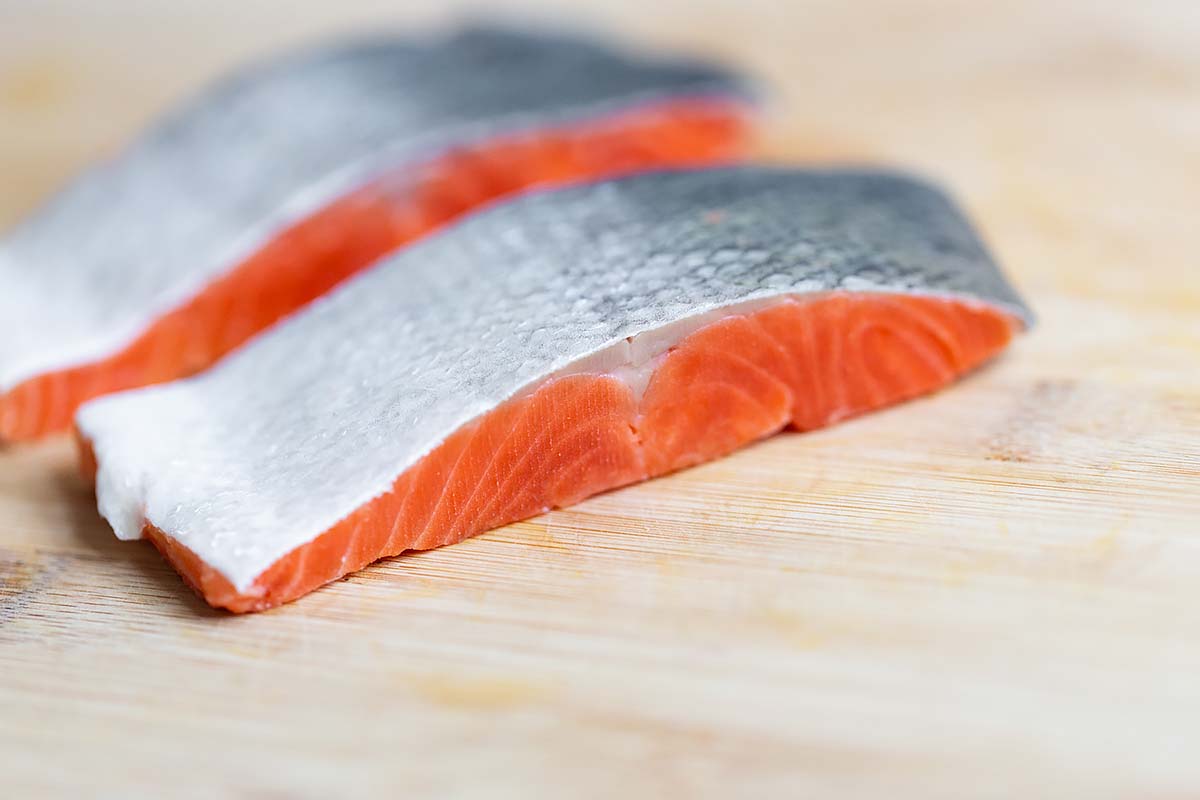 Uncooked salmon from the side.