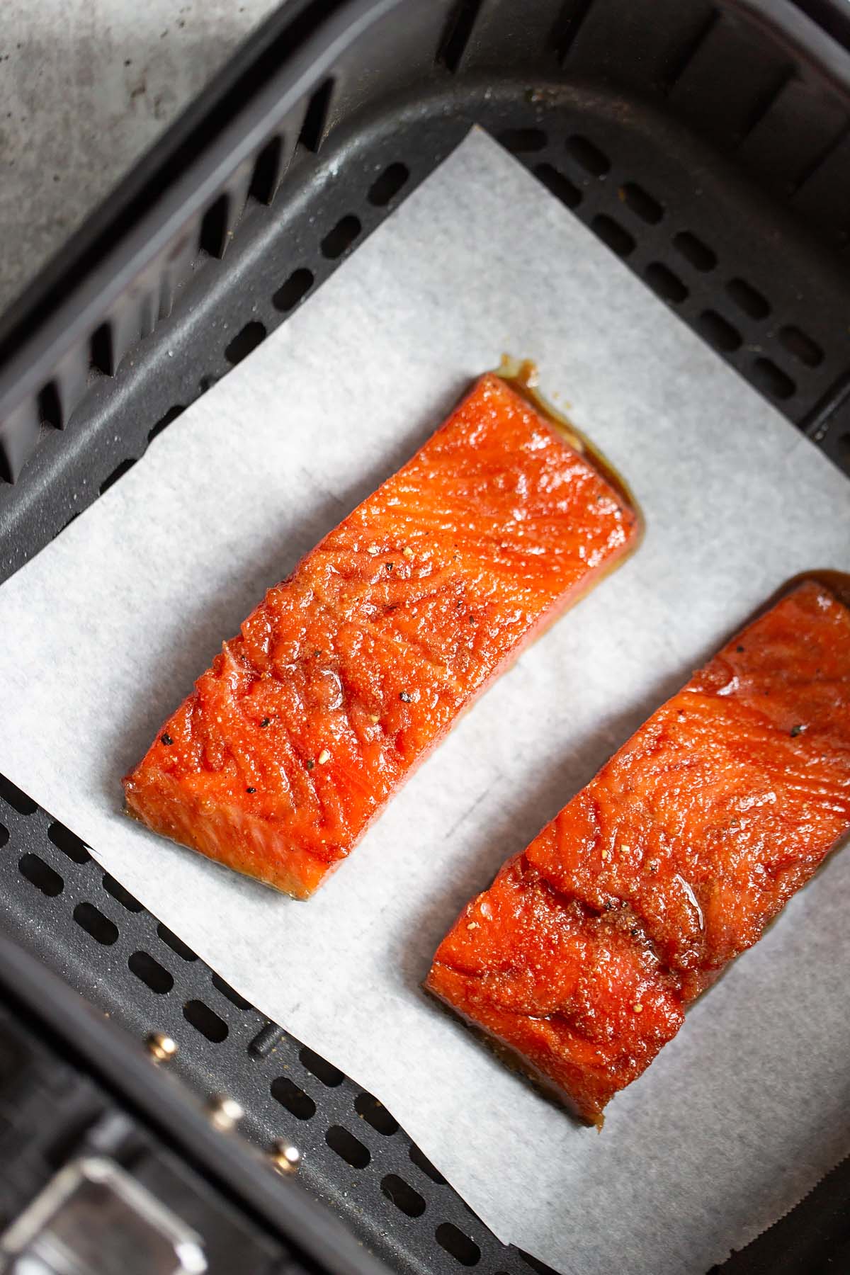 Salmon pieces in the air fryer.