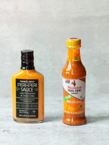 bottles of nandos and trader joes peri peri sauces