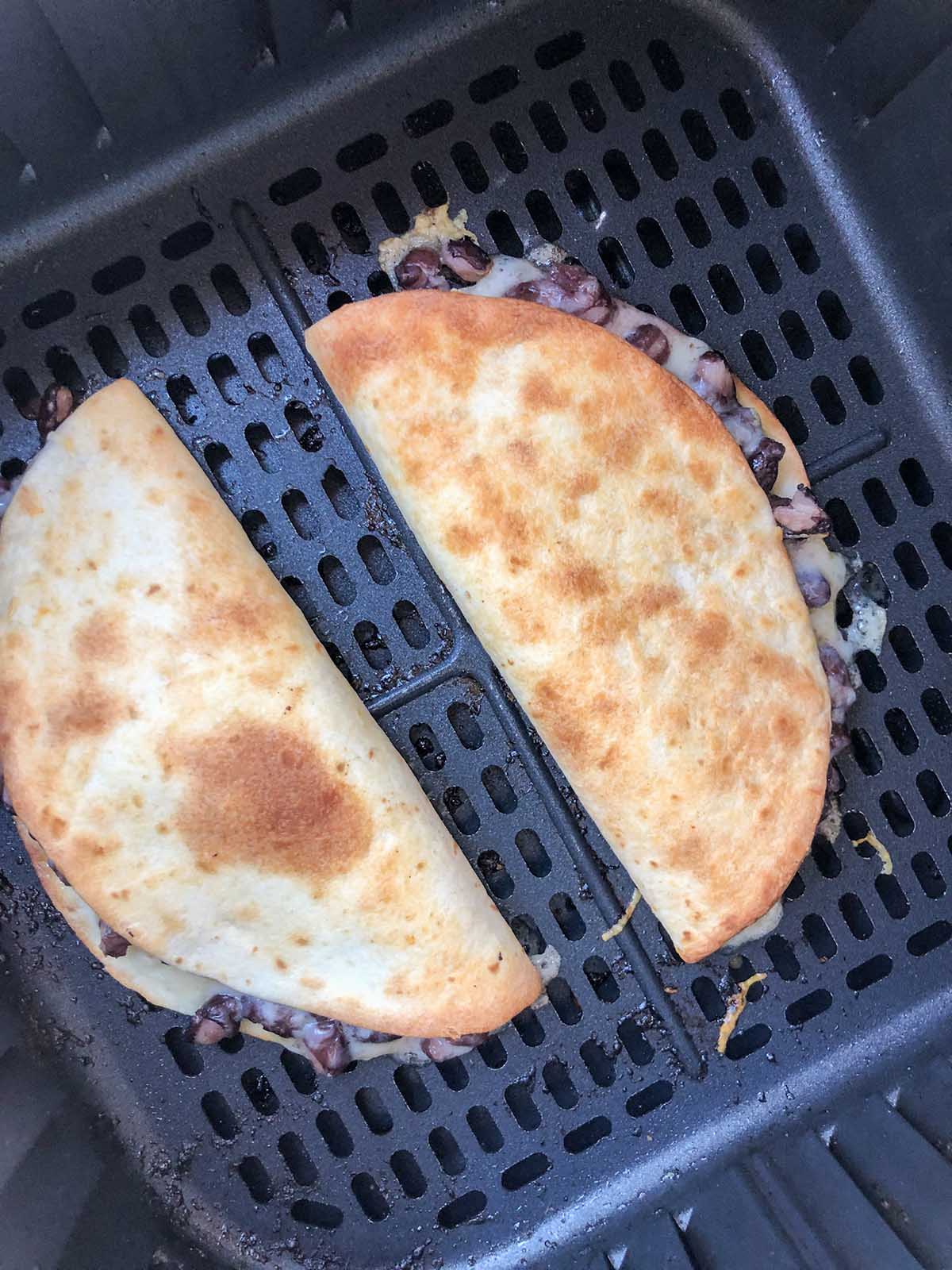 cooked quesadilla in air fryer basket