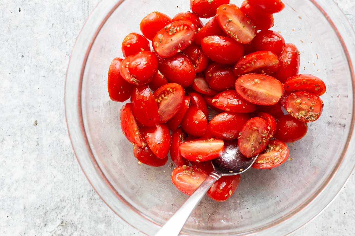 cherry tomatoes in a clear bowl