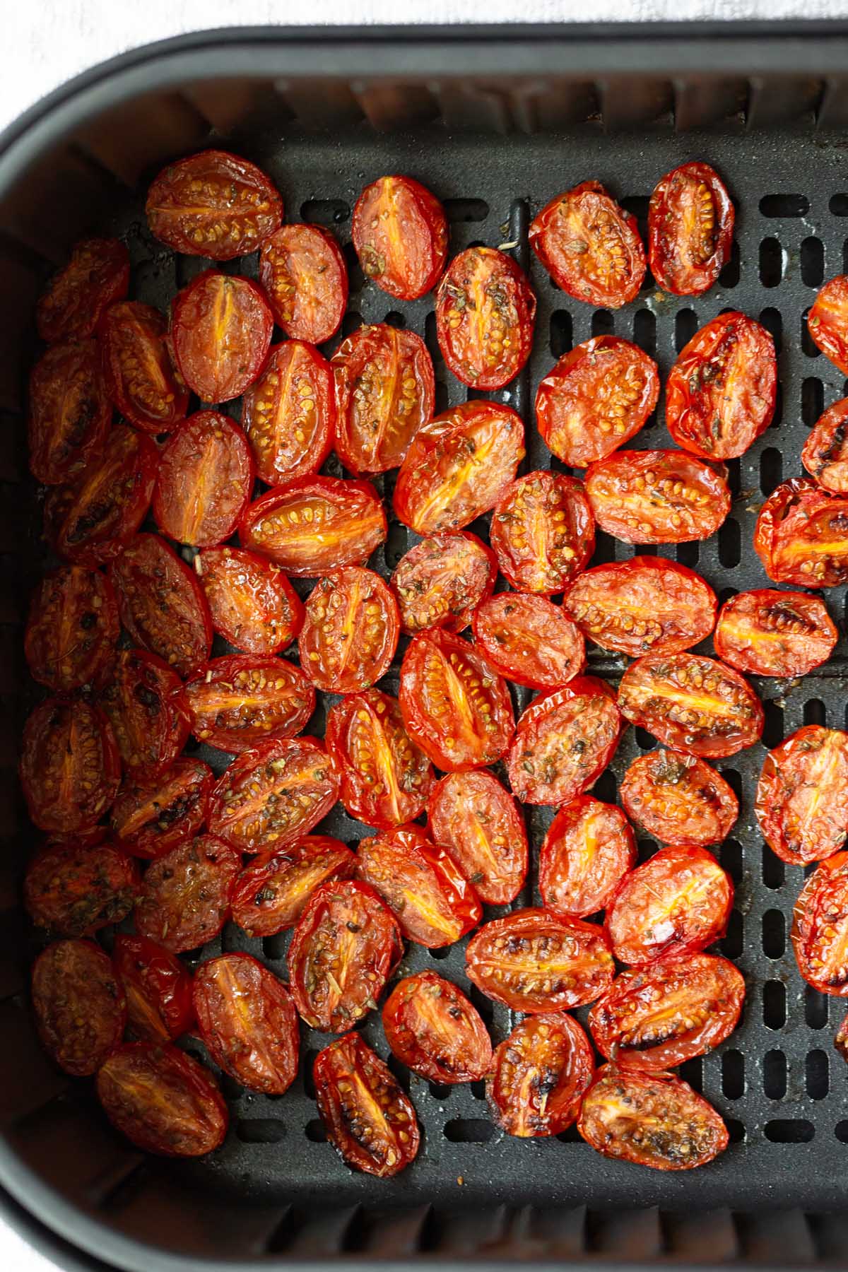 roasted tomatoes in air fryer basket