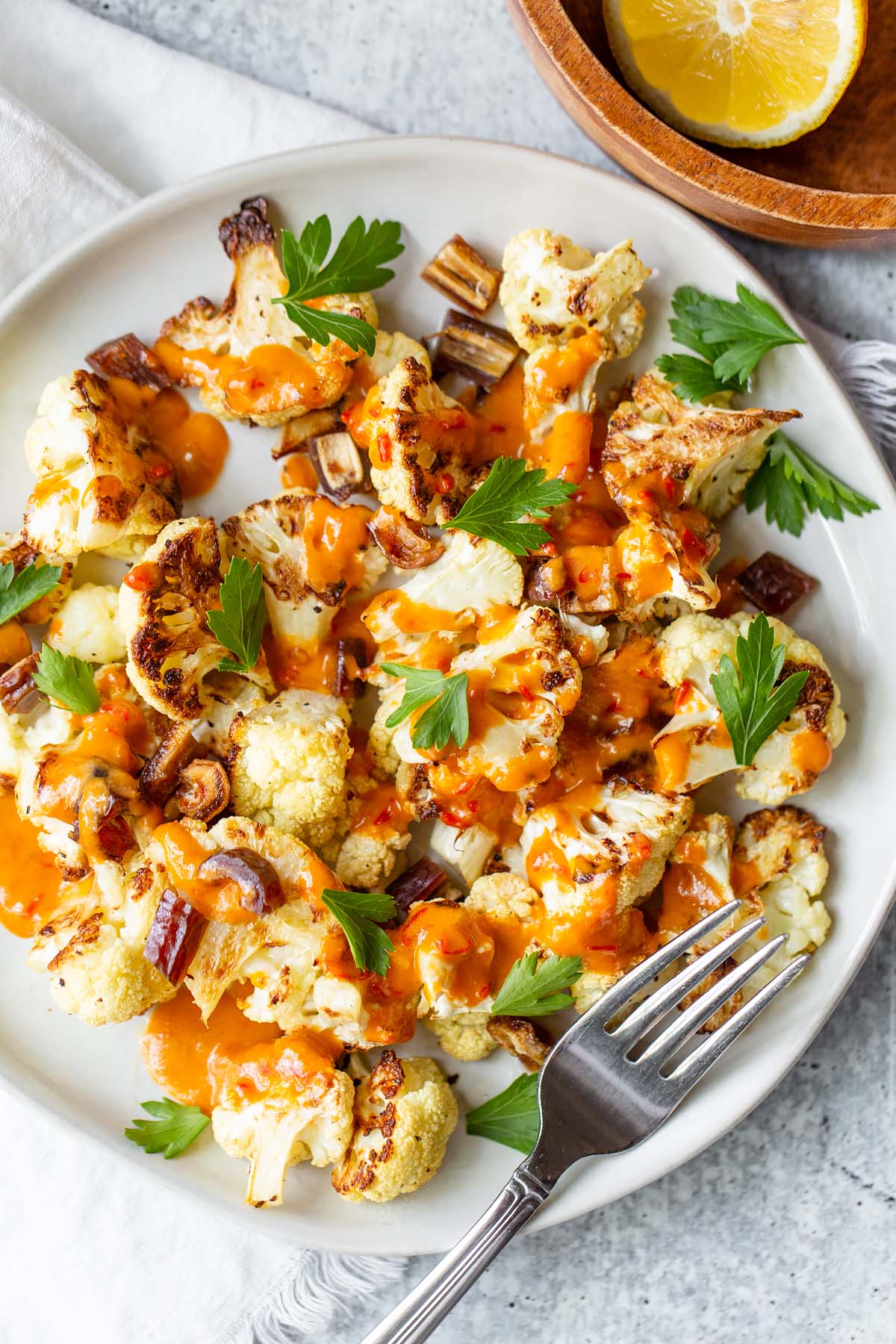 roasted cauliflower topped with harissa sauce
