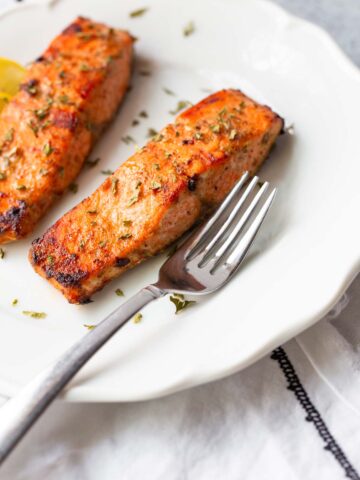 salmon with parsley garnish