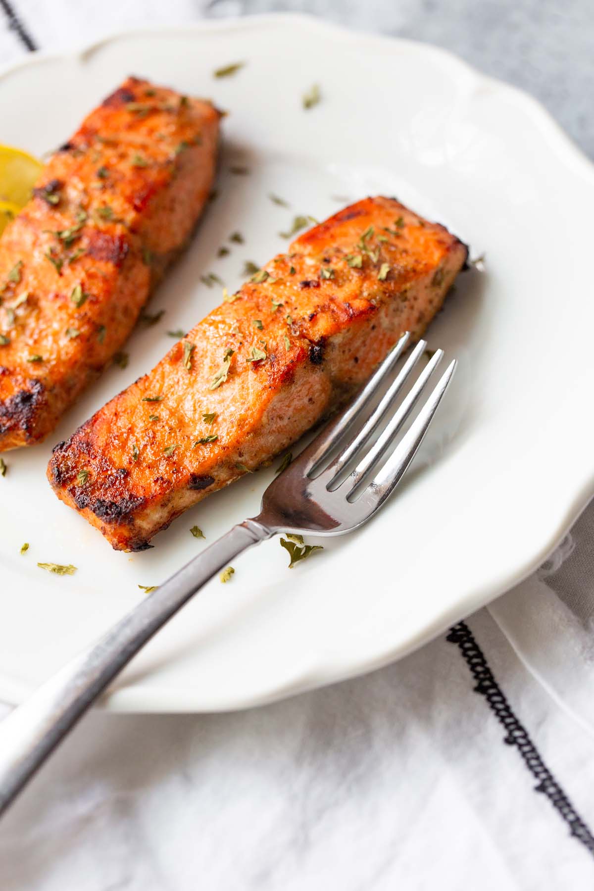 salmon with parsley garnish