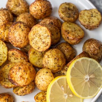 greek potatoes with lemon slices