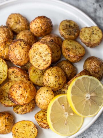 greek potatoes with lemon slices