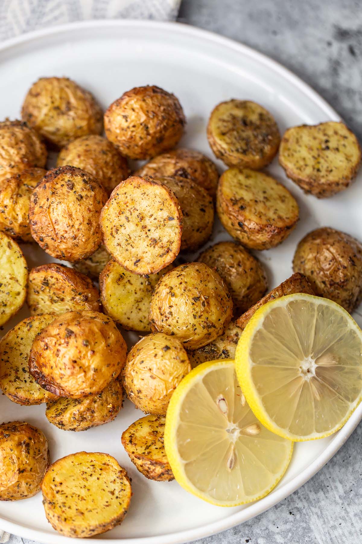 greek potatoes with lemon slices