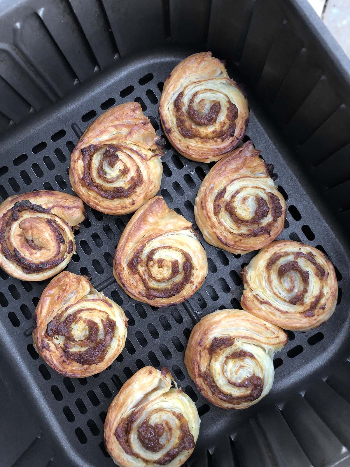 cooked pumpkin pinwheels in an air fryer