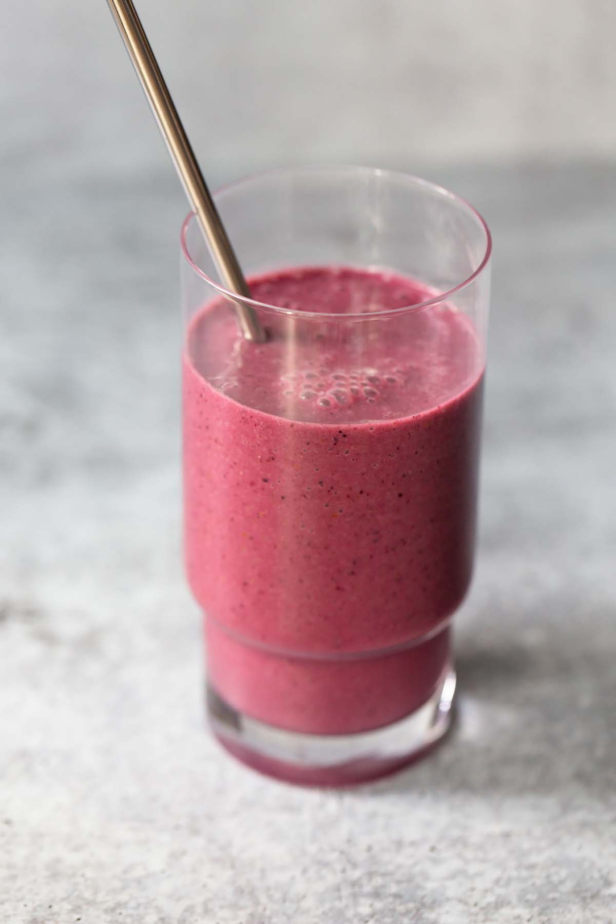 Kefir smoothie smoothie with a straw