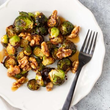 brussels sprouts and walnuts on a plate