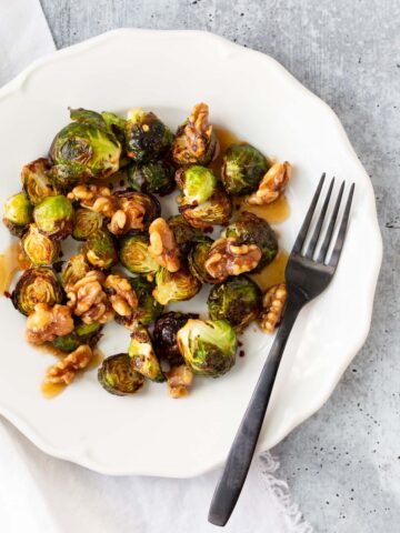 brussels sprouts and walnuts on a plate
