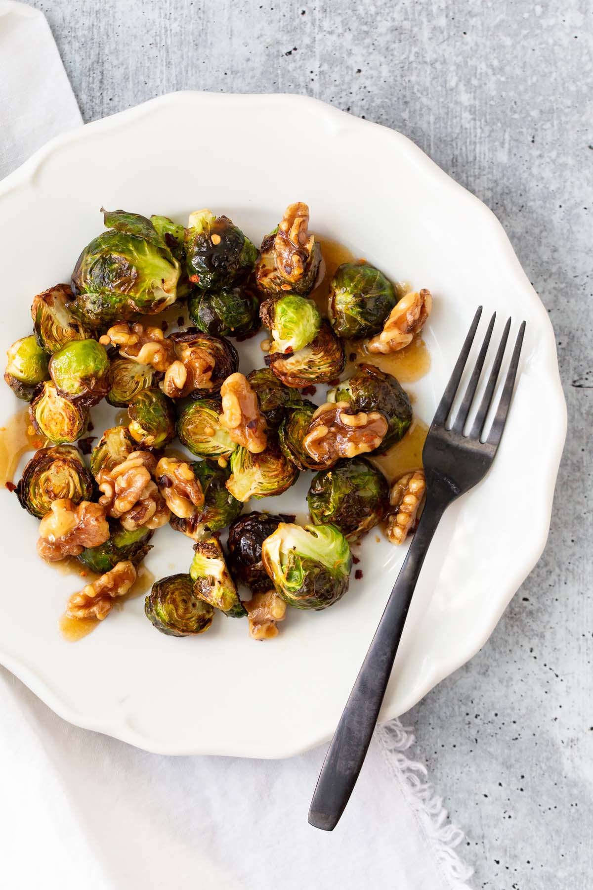 brussels sprouts and walnuts on a plate