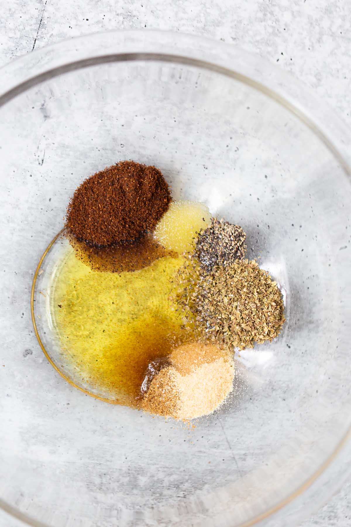 marinade ingredients in a glass bowl