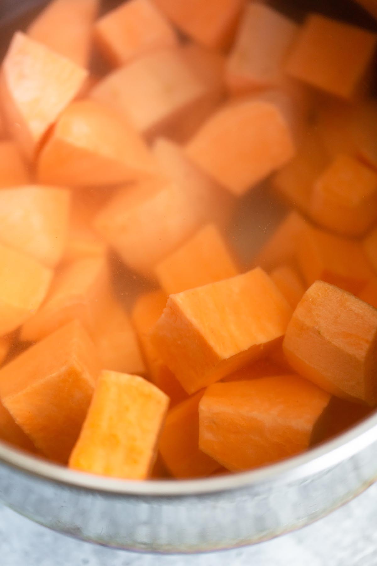 diced sweet potatoes in a pot