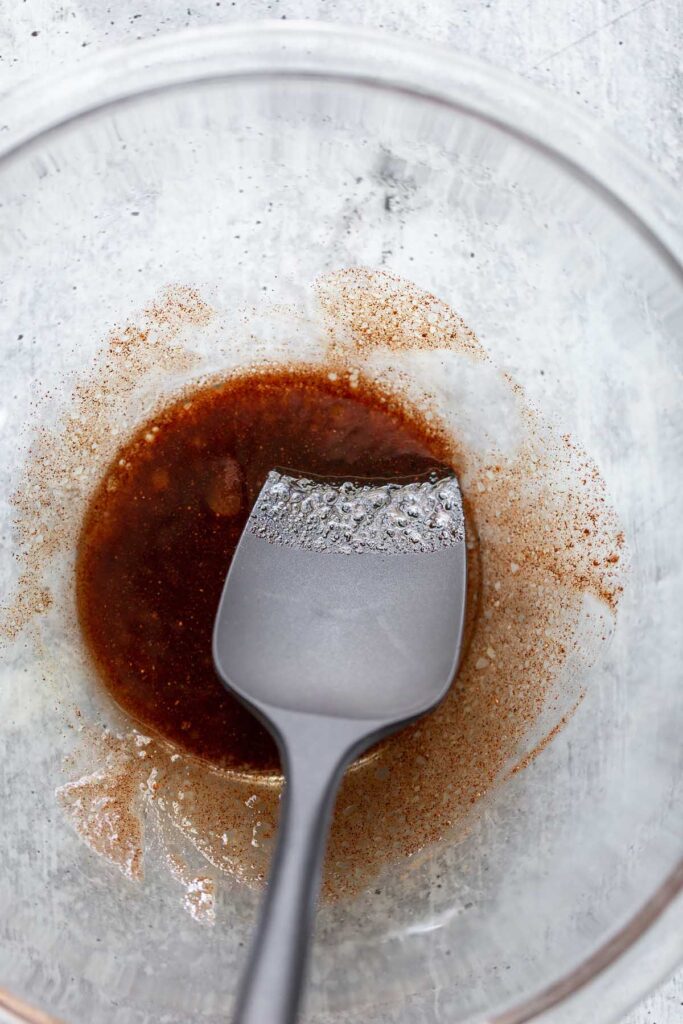 mixing together ingredients in a bowl