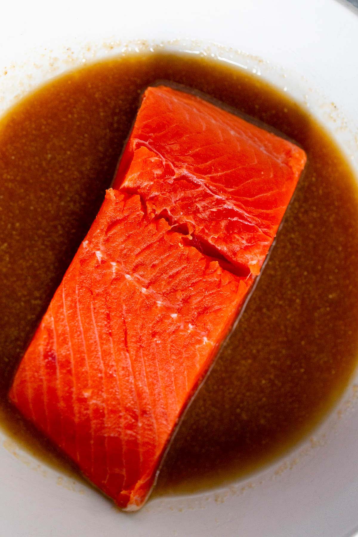 salmon marinating in sauce