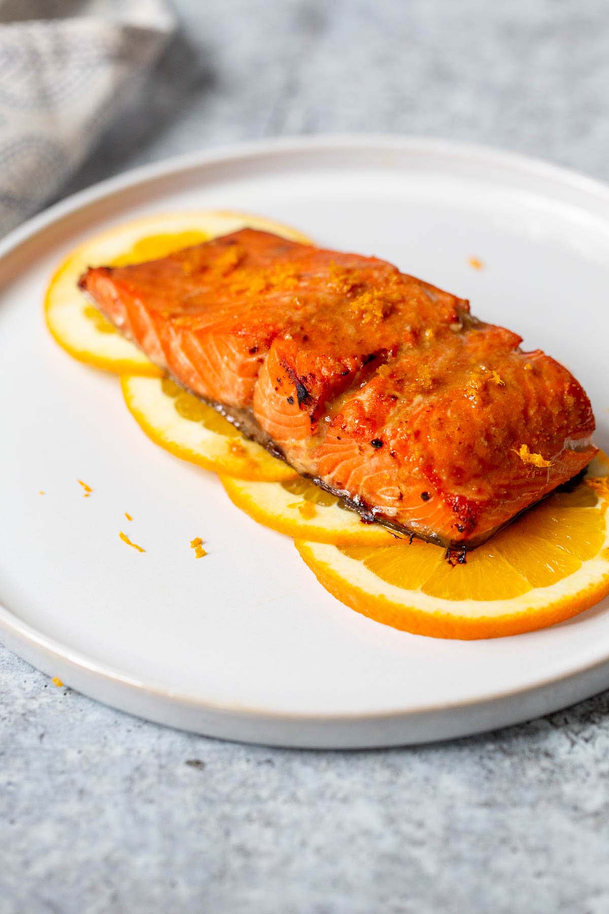 salmon on top of orange slices