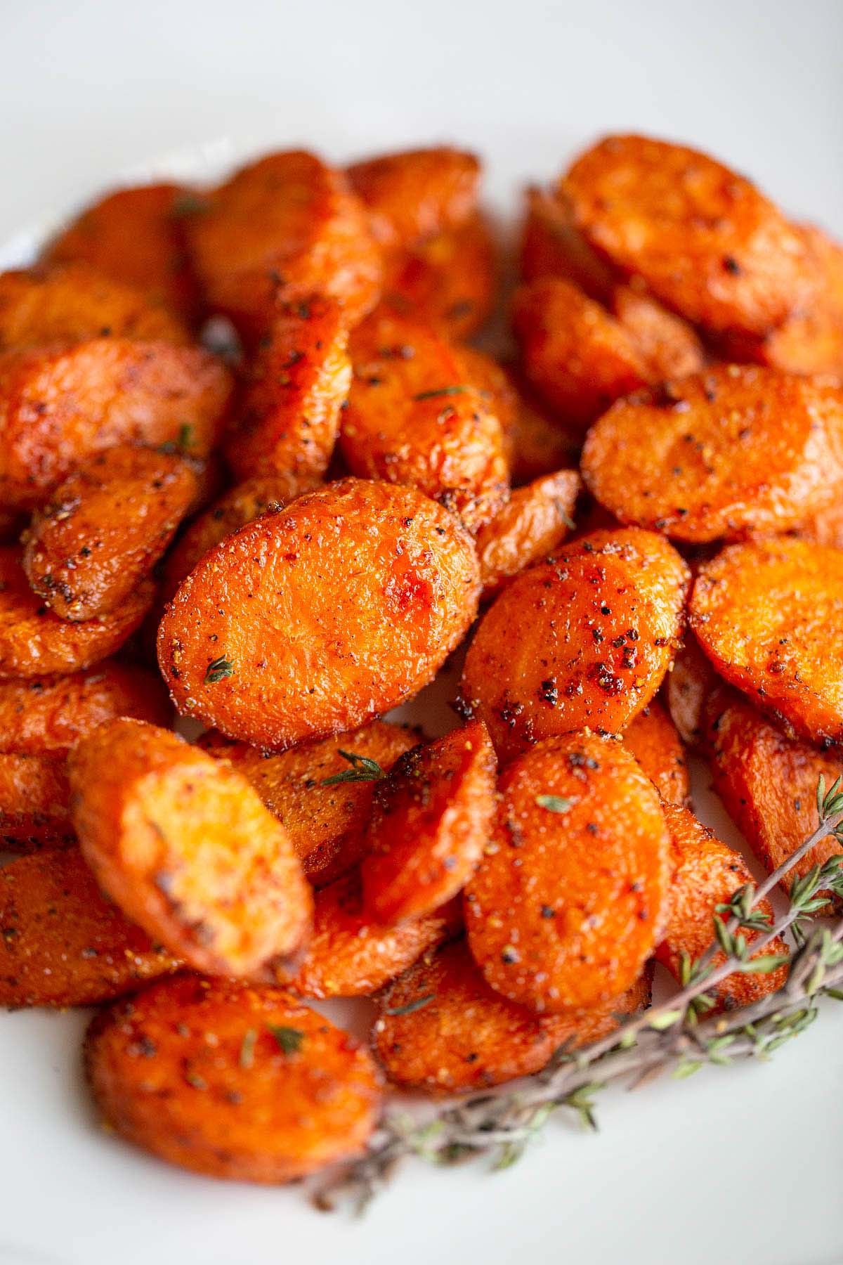 roasted carrots up close with thyme.