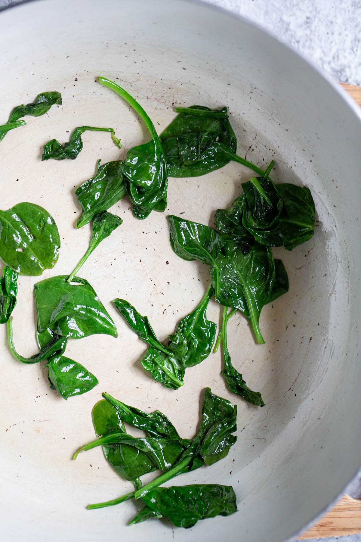 cooked spinach in a skillet