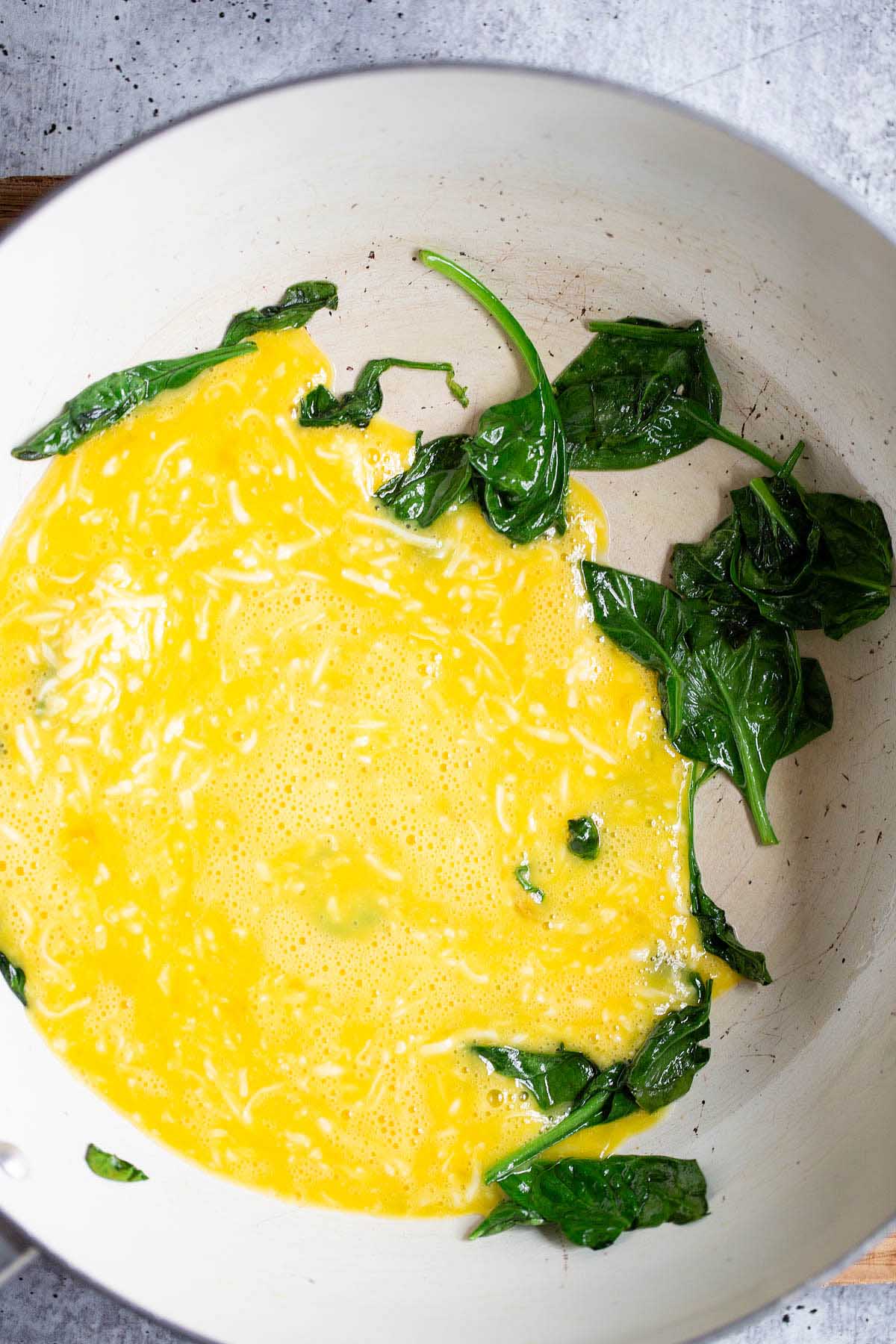 eggs and spinach in a skillet