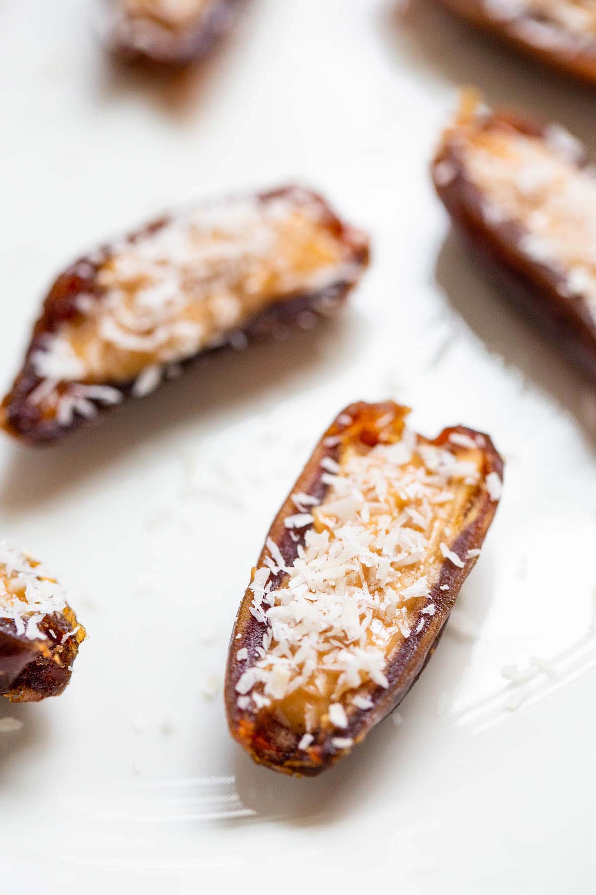 dates up close with peanut butter and coconut.