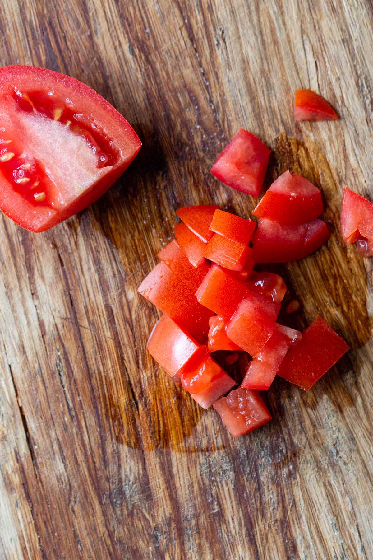 Slicing a roma tomato.