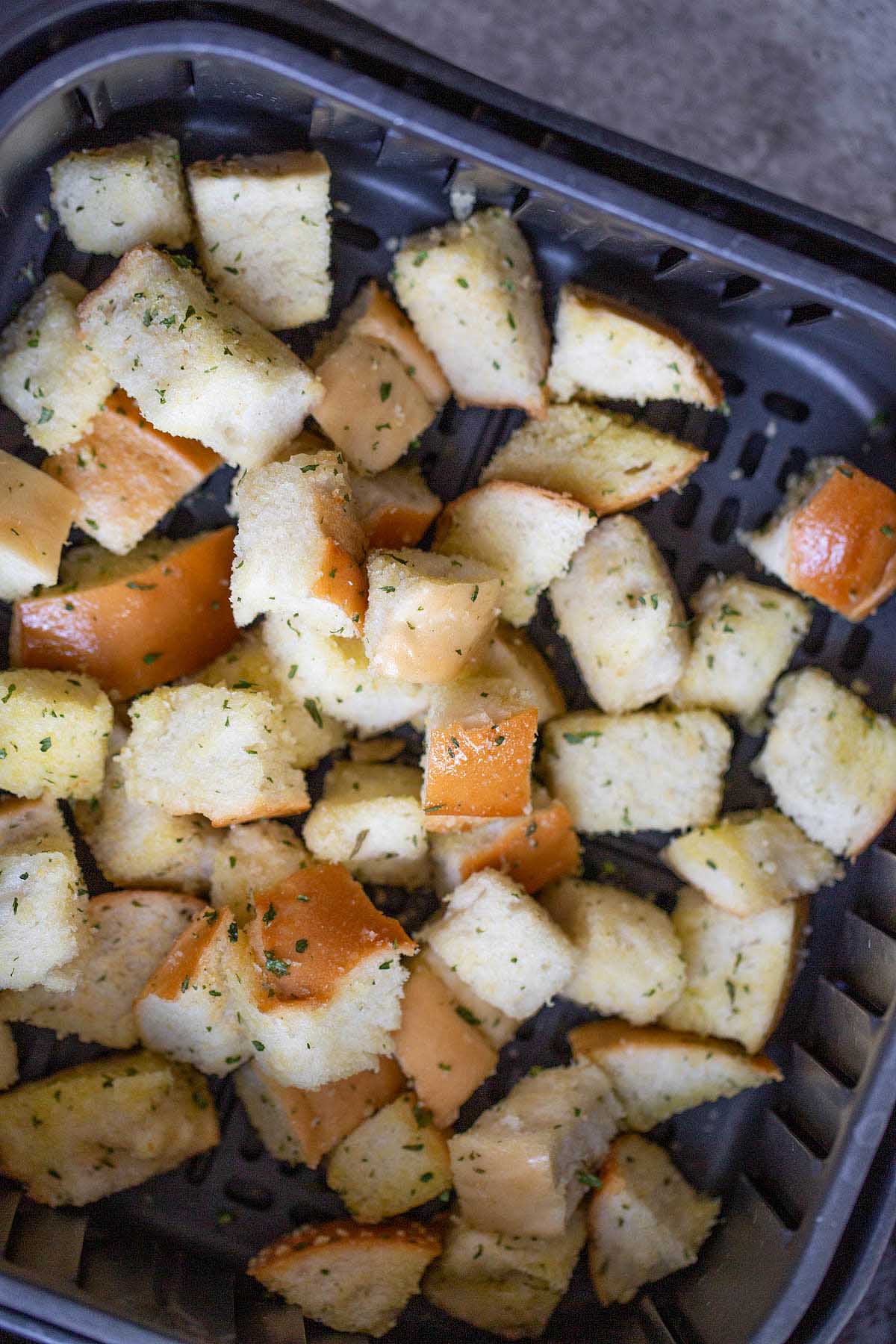 Bread chunks in the air fryer.