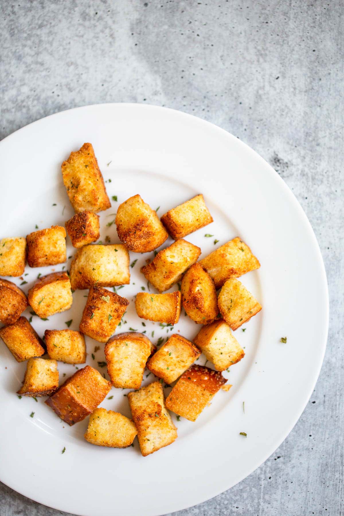 Garlic croutons on a plate.