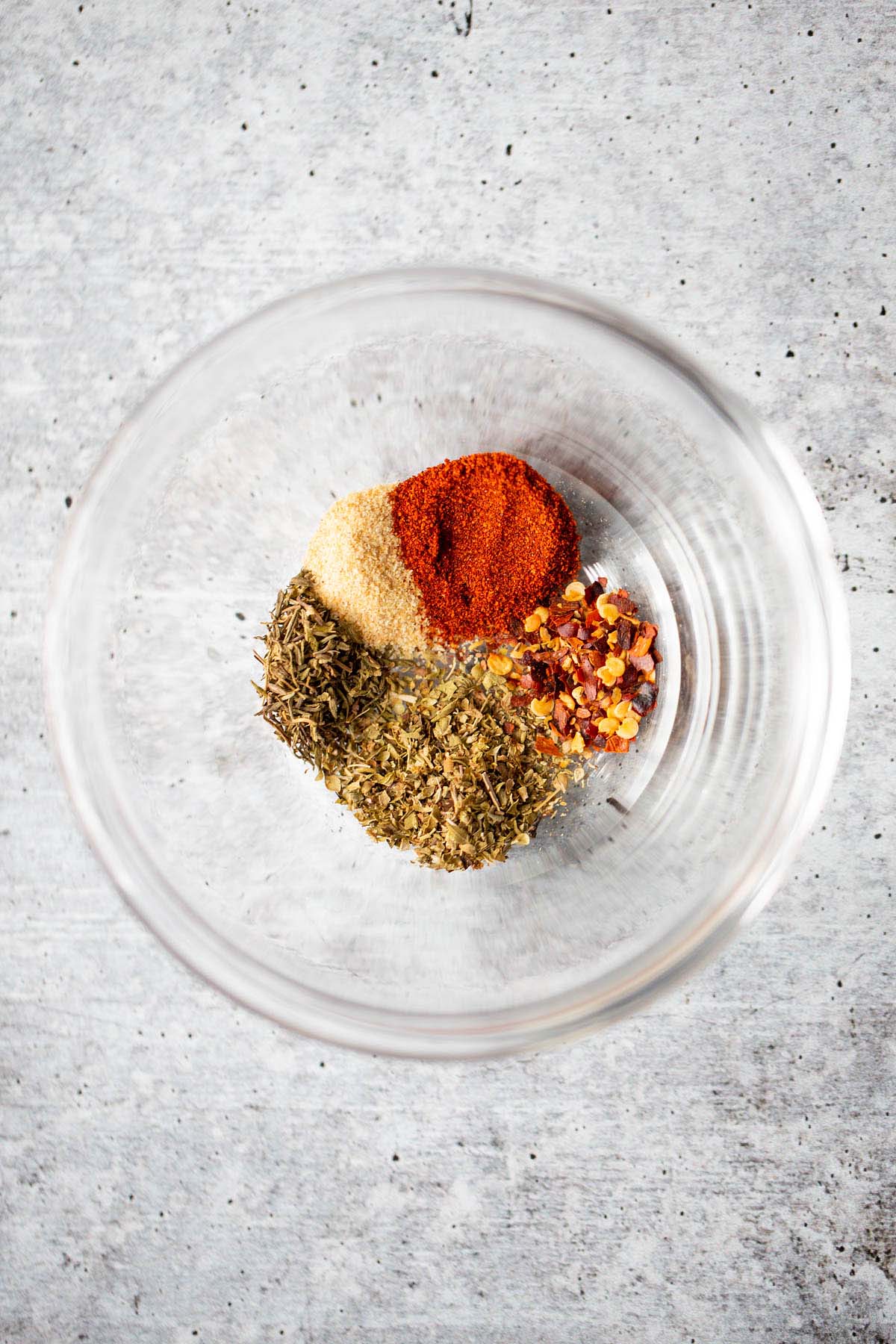 Spices in a glass bowl.