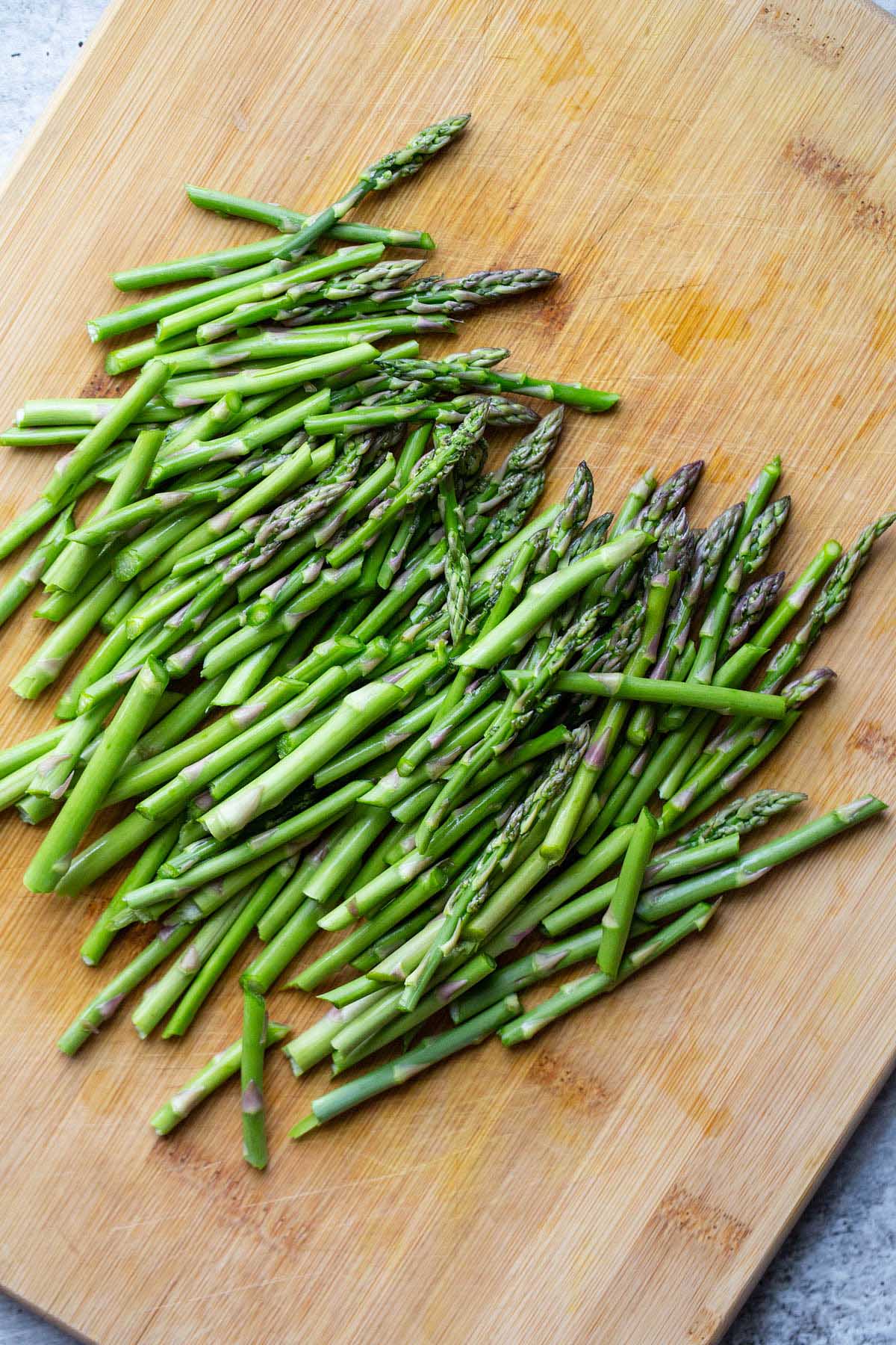 Asparagus on a cutting board.