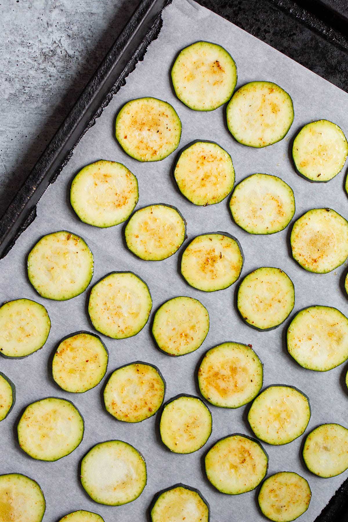 Zucchini on a baking sheet.