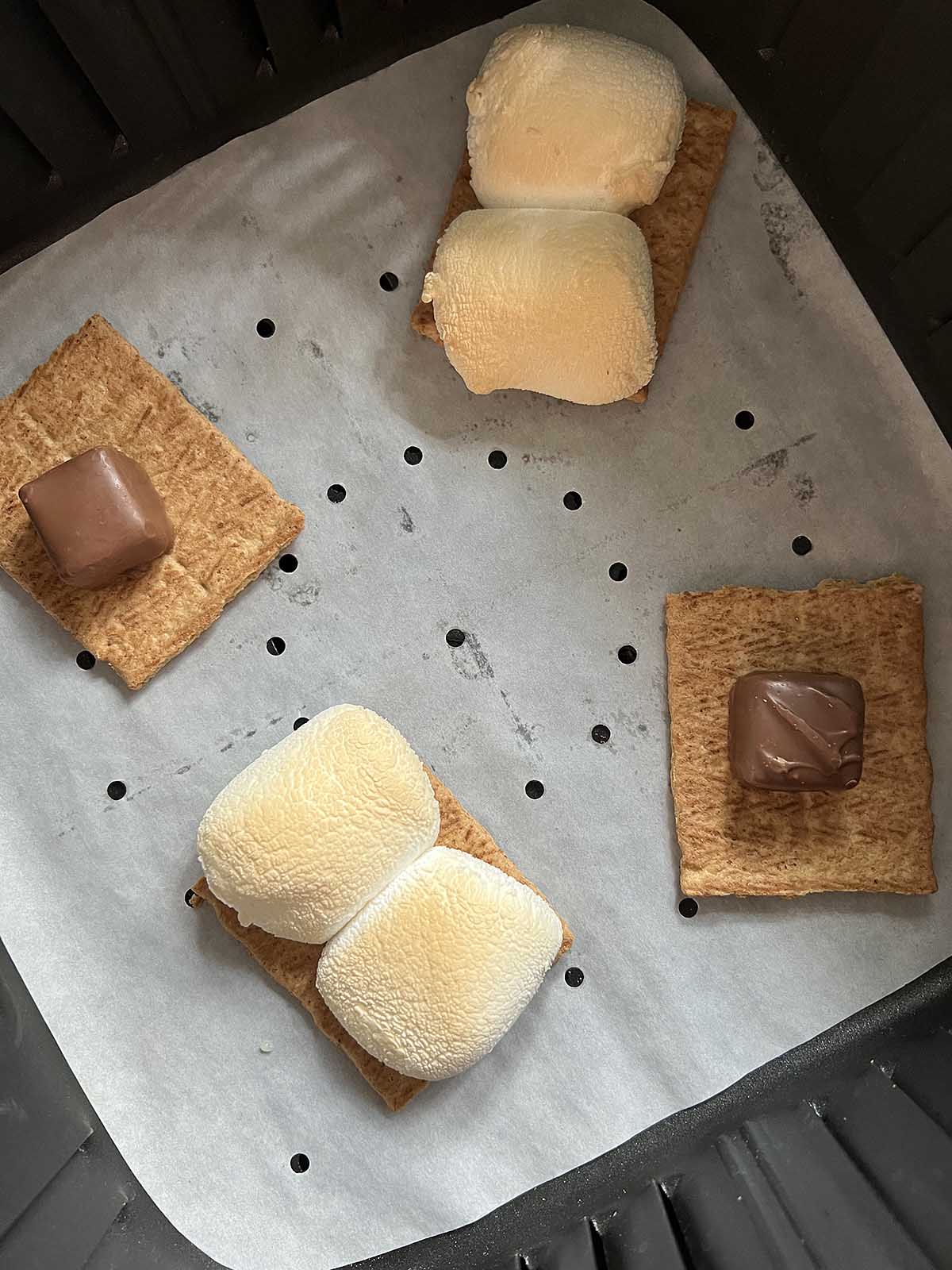 Smores in an air fryer basket.