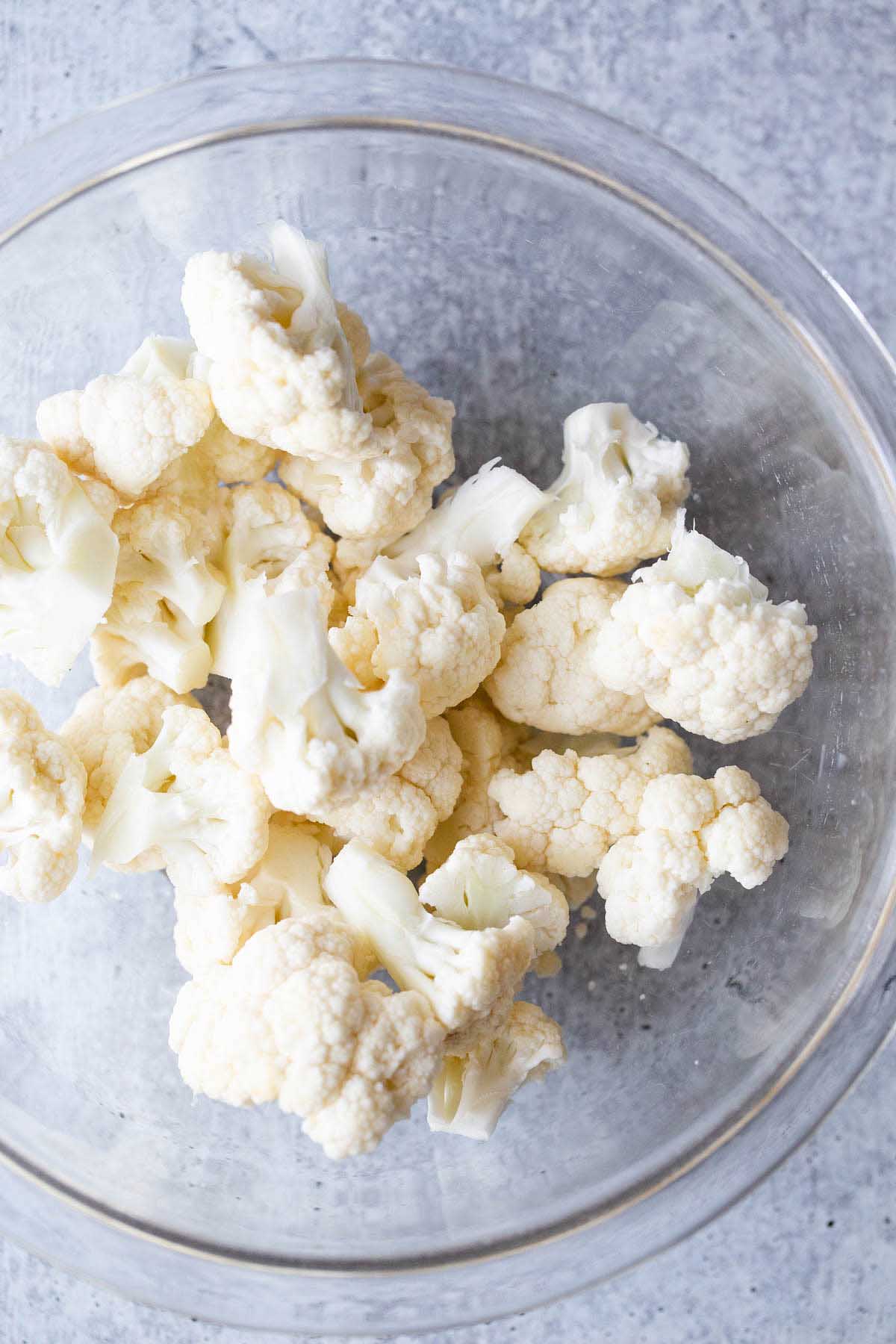 Cauliflower florets in a bowl.