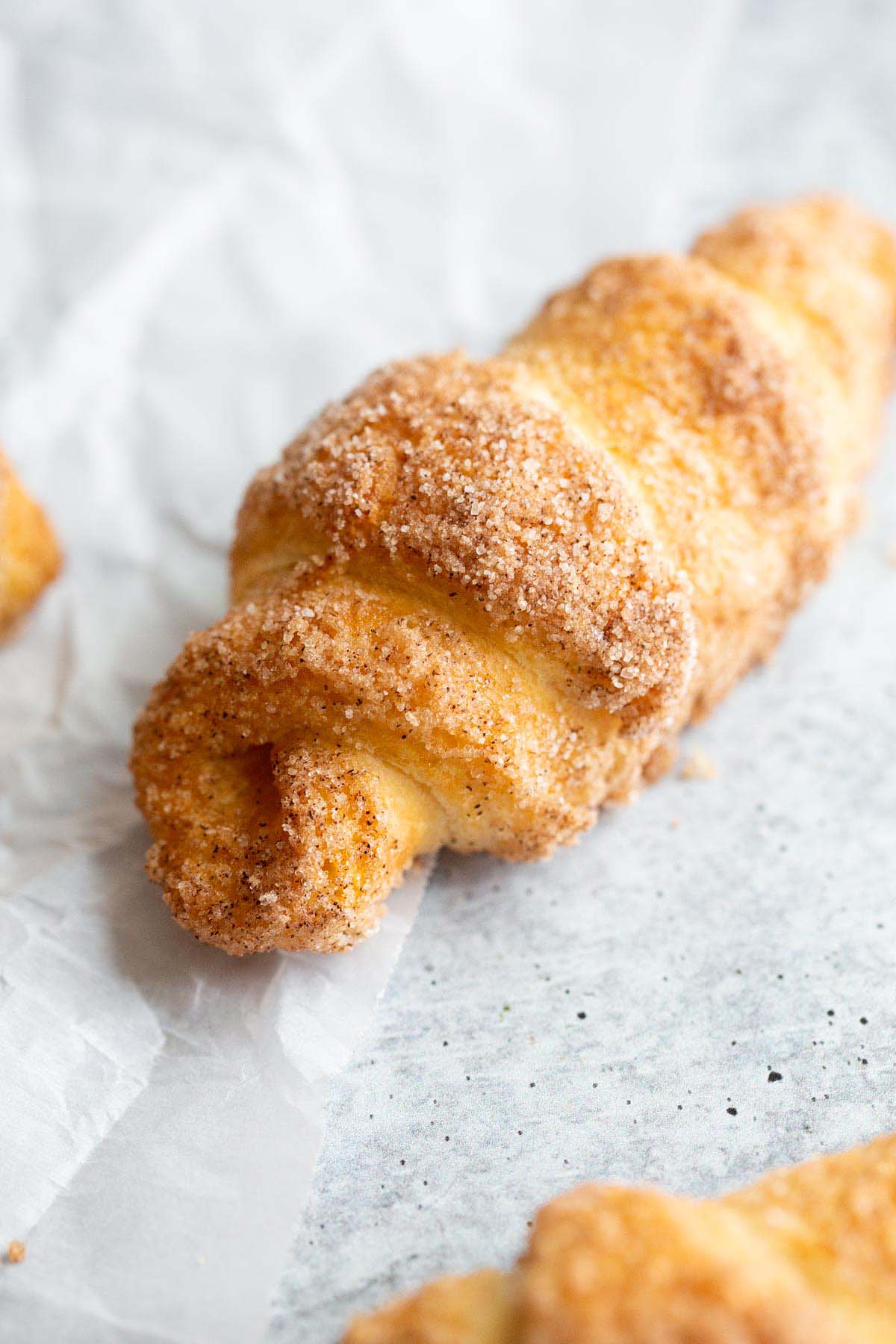 Cinnamon sugar croissant up close.