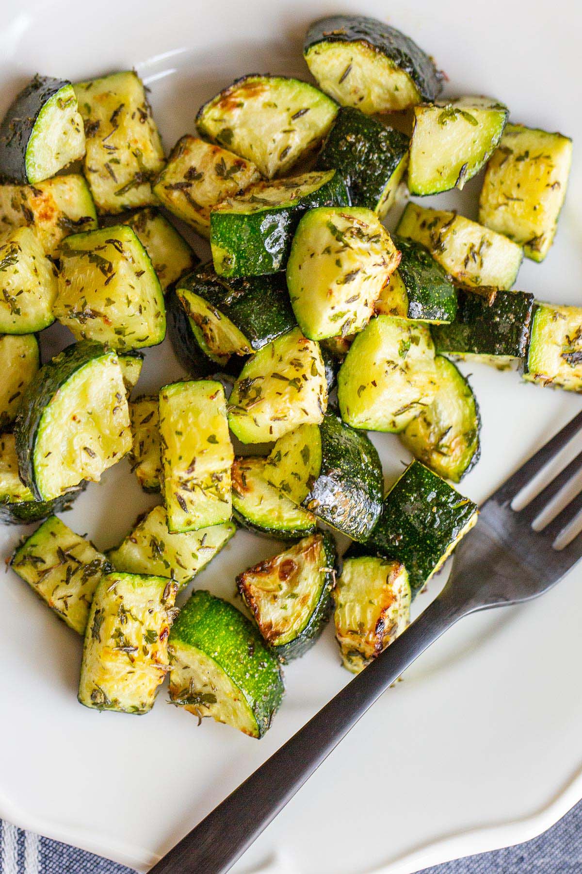 Garlic herb zucchini on a plate.