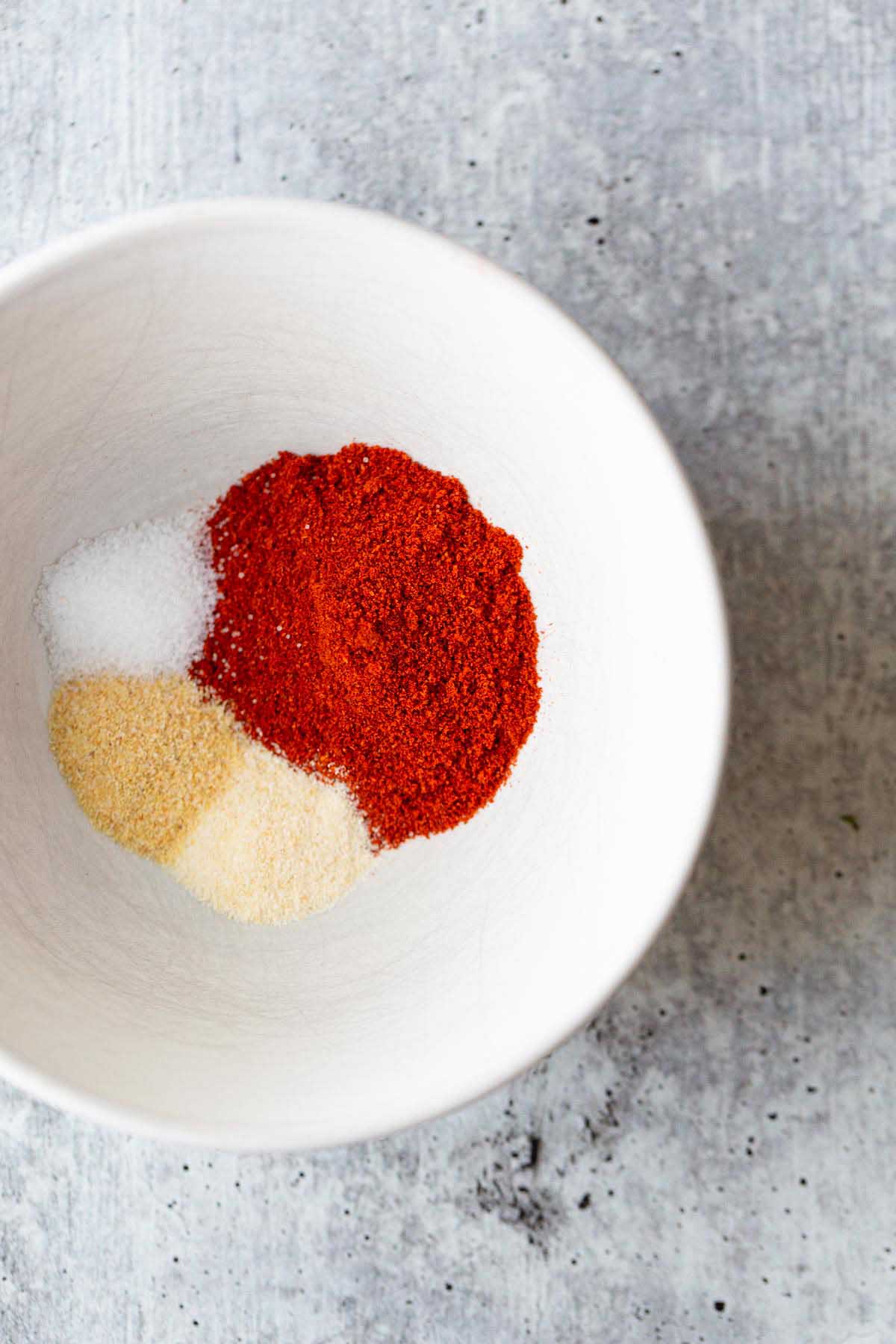 Spices in a white bowl.