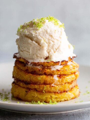 Air Fryer Pineapple with ice cream and lime zest.