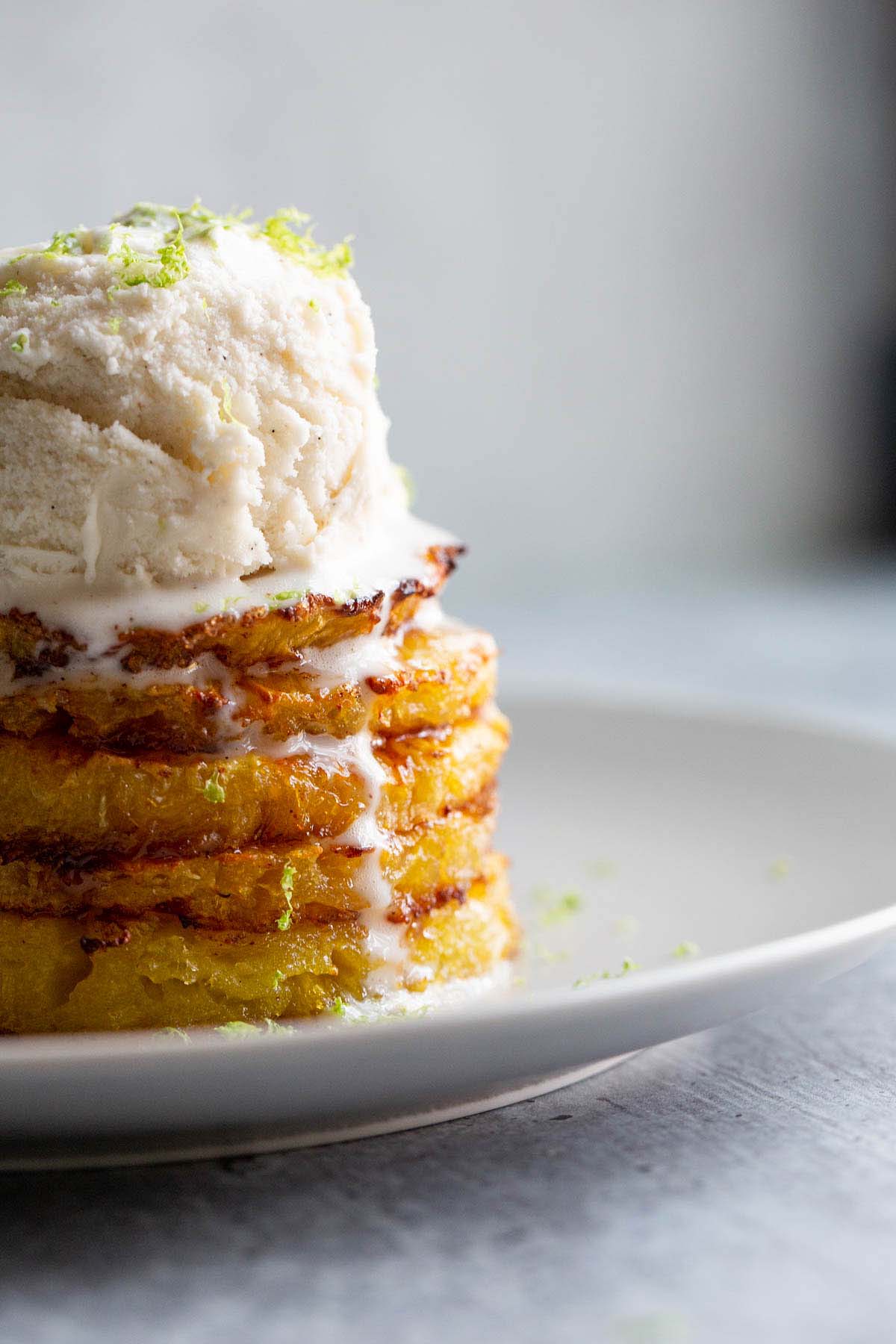 Pineapple with ice cream and lime zest.