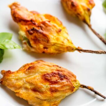 Stuffed zucchini flowers up close.