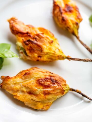 Stuffed zucchini flowers up close.