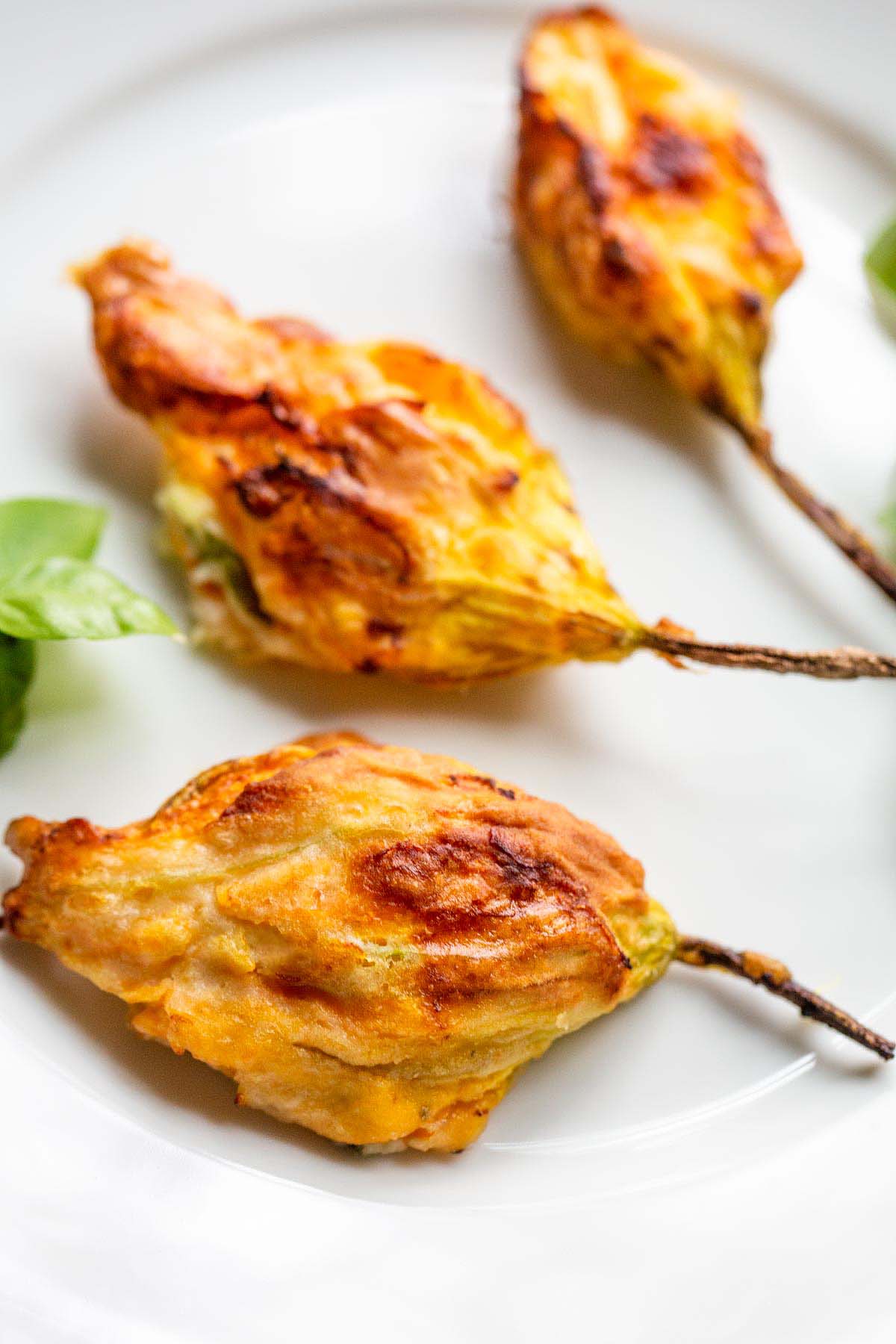 Stuffed zucchini flowers up close.