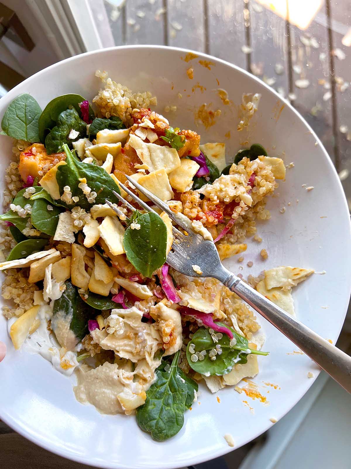 grains and greens bowl mixed together