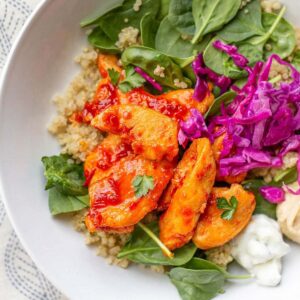 Harissa honey chicken in a salad