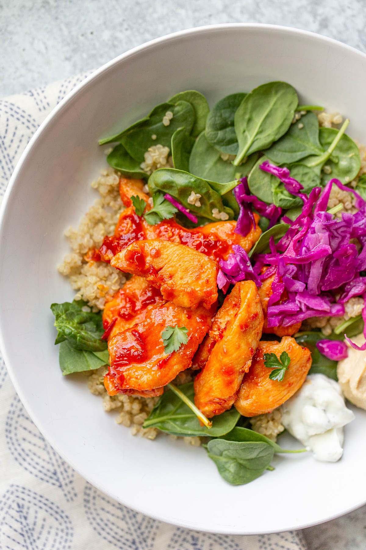 Harissa chicken in a grain bowl.