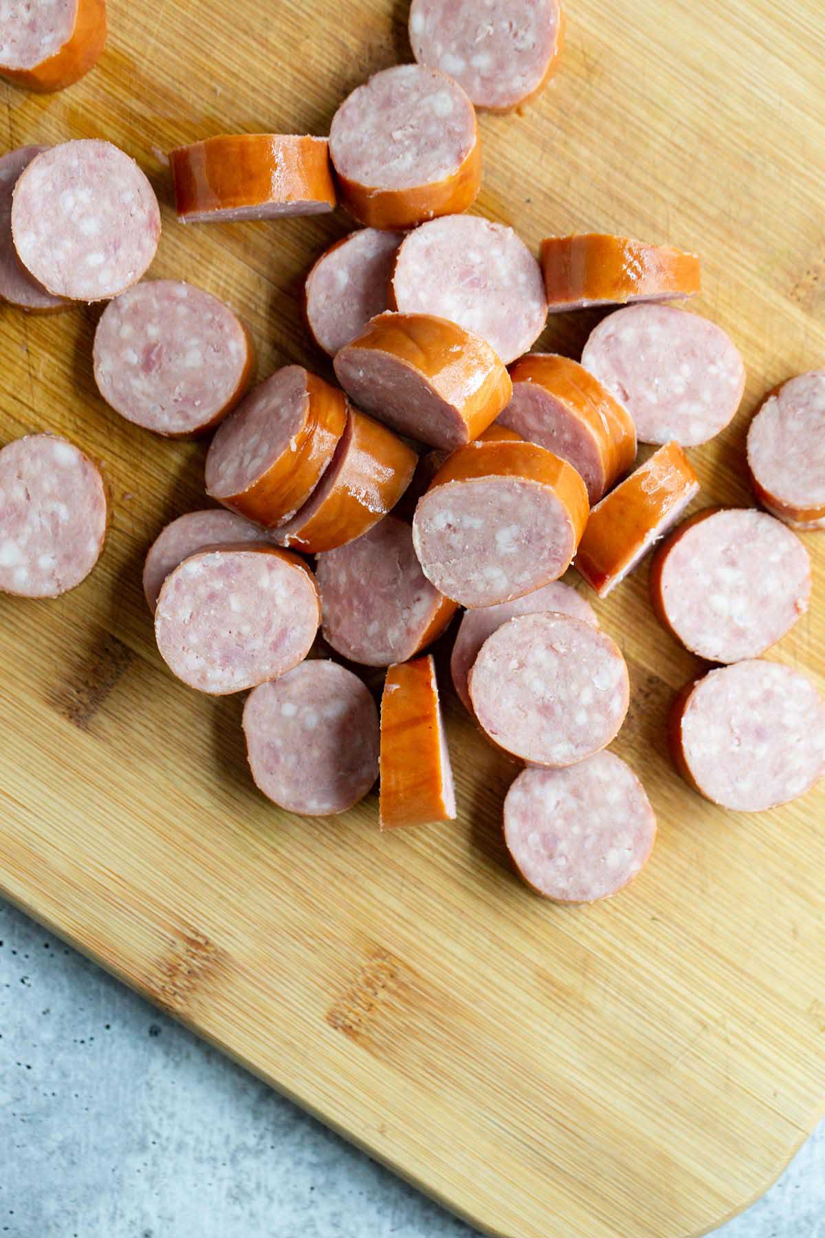 kielbasa slices on cutting board