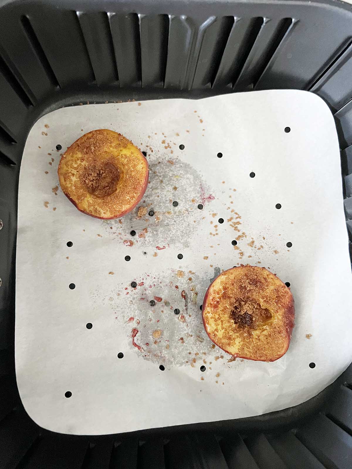 Peaches sprinkled with cinnamon brown sugar mixture.