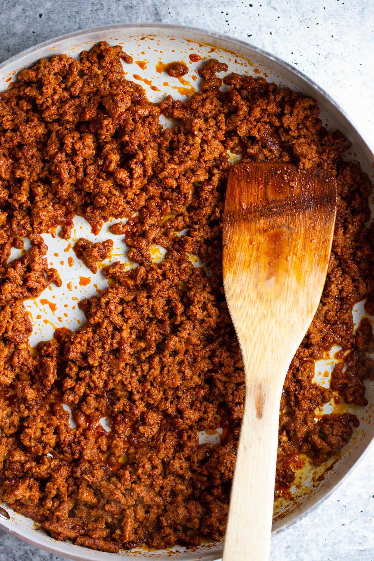 Chorizo cooking in a skillet