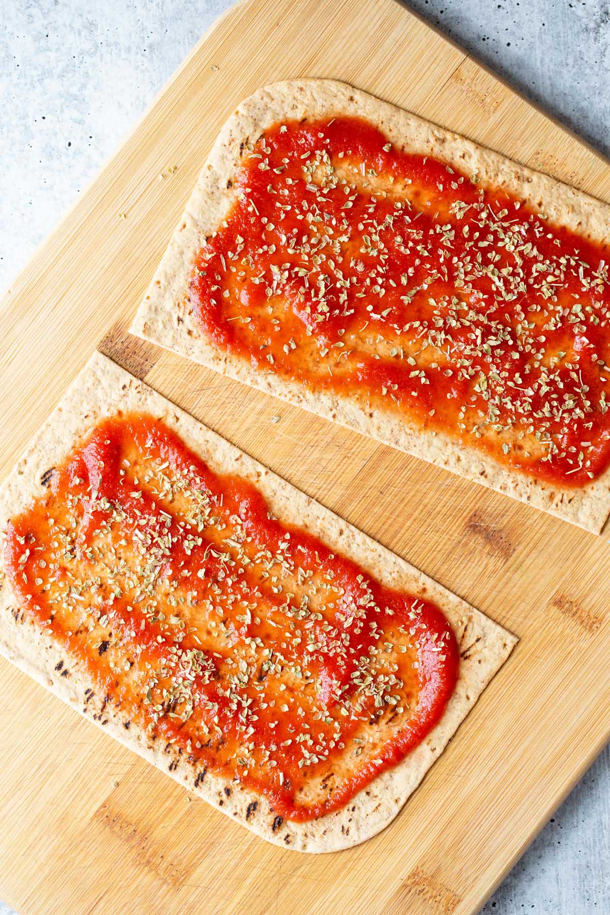 Flatbread with tomato sauce and oregano