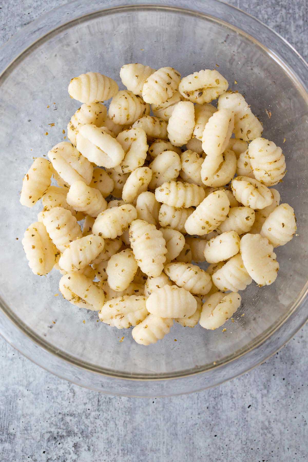 gnocchi in a bowl with oregano